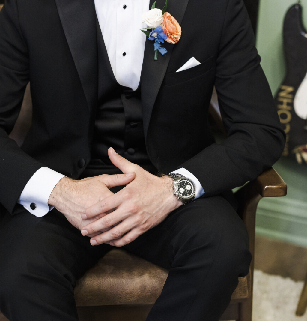 Detail of groom attire and boutonniere inside the Green Room